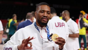 SAITAMA, JAPAN - AUGUST 07: Damian Lillard #6 of Team United States poses for photographs with his gold medal during the Men's Basketball medal ceremony on day fifteen of the Tokyo 2020 Olympic Games at Saitama Super Arena on August 07, 2021 in Saitama, Japan. (Photo by Gregory Shamus/Getty Images)