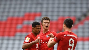 (L-R) Bayern Munich&#039;s German midfielder Serge Gnabry, Bayern Munich&#039;s French defender Benjamin Pavard and Bayern Munich&#039;s Polish forward Robert Lewandowski celebrate the 1-0 during the German first division Bundesliga football match FC Baye