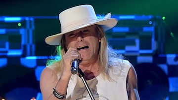 Who is singing the national anthem at the Commanders - Buccaneers Wild Card game today?