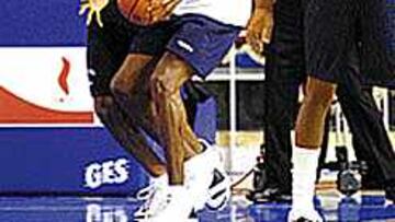 LO VE TODO. Magic Johnson sigue teniendo el juego en su cabeza.