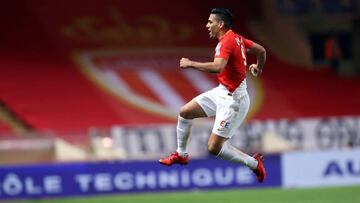 Monaco's Colombian forward Radamel Falcao celebrates after scoring a goal during the French League Cup round of 16 football match between Monaco and Caen at the Louis II stadium in Monaco on December 12, 2017. / AFP PHOTO / VALERY HACHE