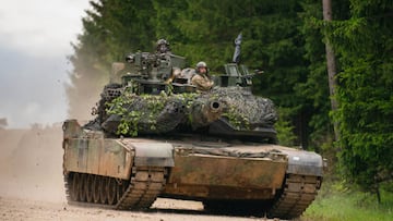 08 June 2022, Bavaria, Hohenfels: A US Army M1 Abrams tank drives across a road during a multinational exercise at the Hohenfels training area. Photo: Nicolas Armer/dpa (Photo by Nicolas Armer/picture alliance via Getty Images)
