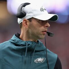 Why did the Arizona Cardinals and Philadelphia Eagles reach a settlement over Jonathan Gannon?