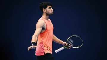 Spain's Carlos Alcaraz reacts during the men’s singles match against France's Giovanni Mpetshi Perricard at the China Open tournament in Beijing on September 27, 2024. (Photo by WANG Zhao / AFP)