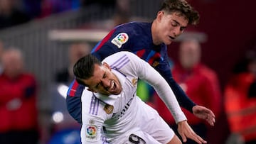 BARCELONA, SPAIN - MARCH 19: Pablo Paez 'Gavi' of FC Barcelona competes for the ball with Dani Ceballos of Real Madrid CF during the LaLiga Santander match between FC Barcelona and Real Madrid CF at Spotify Camp Nou on March 19, 2023 in Barcelona, Spain. (Photo by Pedro Salado/Quality Sport Images/Getty Images)
