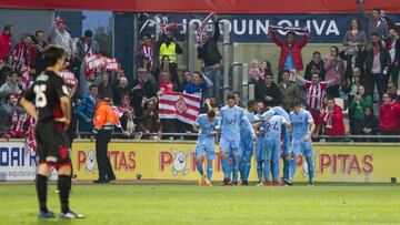 Los jugadores del Girona celebran un gol durante su partido ante el Reus.