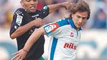 <b>REACCIÓN</b>. El Racing perdía por 2-0 y se llevó un punto de oro de Zaragoza.