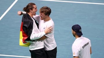 Tennis - Davis Cup - Final 8 - Argentina v Germany - SuperTennis Arena, Bologna, Italy - November 21, 2025 Germany's Alexander Zverev celebrates with Kevin Krawietz after he won his doubles match against Argentina's Andres Molteni and Horacio Zeballos to win their quarter final against Argentina REUTERS/Guglielmo Mangiapane