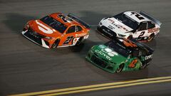 DAYTONA BEACH, FLORIDA - FEBRUARY 11: Bubba Wallace, driver of the #23 DoorDash Toyota, Ross Chastain, driver of the #42 Clover Chevrolet, and Brad Keselowski, driver of the #2 Discount Tire Ford, race during the NASCAR Cup Series Bluegreen Vacations Duel