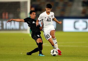 Soccer Football - FIFA Club World Cup Third Place Match - Al Jazira vs CF Pachuca - Zayed Sports City Stadium, Abu Dhabi, United Arab Emirates - December 16, 2017   Al Jazira’s Mohamad Al Attas in action with Pachuca's Erick Aguirre    REUTERS/Matthew Chi