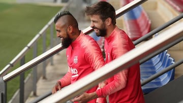 Soccer Football - Champions League - FC Barcelona Training - Ciutat Esportiva Joan Gamper, Barcelona, Spain - April 15, 2019 Barcelona's Arturo Vidal and Gerard Pique during training REUTERS/Albert Gea