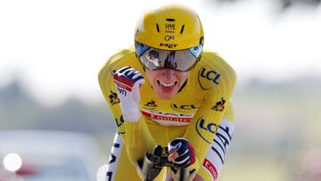 Cycling - Tour de France - Stage 20 - Libourne to Saint-Emilion - France - July 17, 2021 UAE Team Emirates rider Tadej Pogacar of Slovenia wearing the yellow jersey in action during stage 20 REUTERS/Stephane Mahe