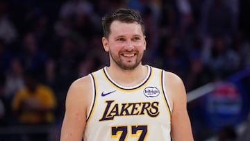 Los Angeles Lakers forward/guard Luka Doncic (77) smiles during a break in the action against the Golden State Warriors in the third period at Chase Center.