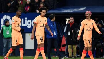 (From L) Atletico Madrid's French midfielder Geoffrey Kondogbia, Atletico Madrid's Belgian midfielder Axel Witsel and Atletico Madrid's French forward Antoine Griezmann react after winning the Spanish league football match between CA Osasuna and Club Atletico de Madrid at El Sadar stadium in Pamplona on January 29, 2023. (Photo by ANDER GILLENEA / AFP) (Photo by ANDER GILLENEA/AFP via Getty Images)