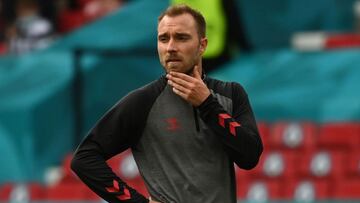 (FILES) In this file photograph taken on June 12, 2021, Denmark&#039;s midfielder Christian Eriksen warms up before the UEFA EURO 2020 Group B football match between Denmark and Finland at the Parken Stadium in Copenhagen. - Danish footballer Christian Er