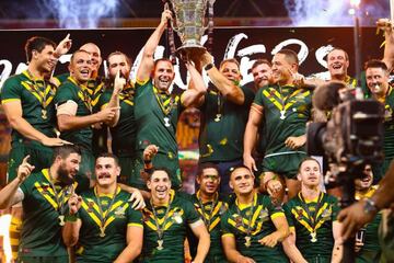 2017 Australian team member's celebrate their victory in the Rugby League World Cup men's final match between Australia and England in Brisbane.