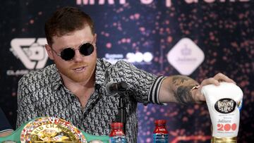 Mexican boxer Canelo Alvarez gestures during a press conference to present his fight against English boxer John Ryder on May 6, in Zapopan, Jalisco state, Mexico, on March 14, 2023. (Photo by Ulises Ruiz / AFP)