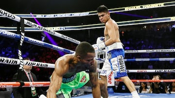 Las Vegas (United States), 17/11/2023.- Robson Conceicao (L) of Brazil takes a fall while in action against Emanuel Navarrete (R) of Mexico during their 12 Round WBO Jr. Lightweight World Title fight at the T-Mobile Arena in Las Vegas, Nevada, 16 November 2023. (Brasil) EFE/EPA/ETIENNE LAURENT
