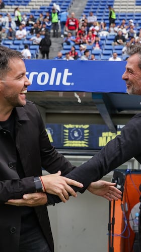 Nicolas Larcamon head coach of Cruz Azul and Diego Cocca head coach of Atlas during the 2nd round match between Cruz Azul and Atlas as part of the Liga BBVA MX, Torneo Clausura 2026 at Cuauhtemoc Stadium, on January 14, 2026 in Puebla, Mexico.