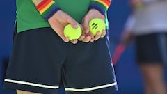 A ball boy wears LGBTQ+ wristbands during the US Open tennis match)