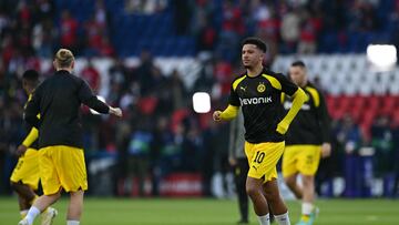 Dortmund's English midfielder #10 Jadon Sancho (2R) warms up ahead of the UEFA Champions League semi-final second leg football match between Paris Saint-Germain (PSG) and Borussia Dortmund, at the Parc des Princes stadium in Paris on May 7, 2024. (Photo by MIGUEL MEDINA / AFP)