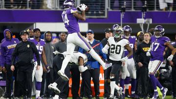 MINNEAPOLIS, MN - JANUARY 14: Stefon Diggs #14 of the Minnesota Vikings makes a catch over Marcus Williams #43 of the New Orleans Saints during the second half of the NFC Divisional Playoff game at U.S. Bank Stadium on January 14, 2018 in Minneapolis, Minnesota.   Jamie Squire/Getty Images/AFP
 == FOR NEWSPAPERS, INTERNET, TELCOS &amp; TELEVISION USE ONLY ==