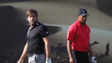 Robert Rock y Tiger Woods.