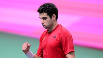 Spain's Jaume Munar Clar gestures as he plays against Italy's Flavio Cobolli during their 2025 Davis Cup men's single final tennis match at the Super Tennis Arena in Bologna, northen Italy, on November 23, 2025. (Photo by Tiziana FABI / AFP)