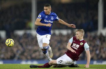 Burnley defender Ben Mee (6) gets the tackle on Everton forward Richarlison (7) during the English championship Premier League football match between Everton and Burnley on December 26, 2019 at Goodison Park