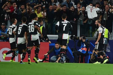 TURIN, ITALY - OCTOBER 01:  Gonzalo Higuain of FC Juventus celebrates after scoring the first goal of his team with teammates during the UEFA Champions League group D match between Juventus and Bayer Leverkusen at Juventus Arena on October 1, 2019 in Turin, Italy.