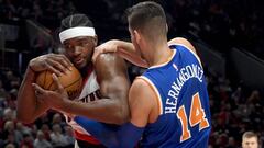 Mar 23, 2017; Portland, OR, USA; Portland Trail Blazers forward Noah Vonleh (21) and New York Knicks center Willy Hernangomez (14) battle for a rebound during the first half of the game at the Moda Center. Mandatory Credit: Steve Dykes-USA TODAY Sports