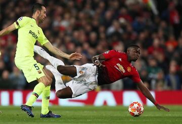 Paul Pogba y Sergio Busquets.