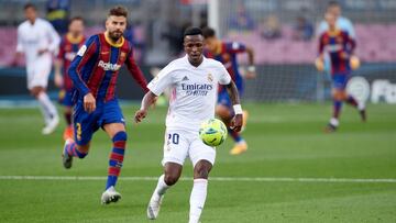 Vinicius Junior of Real Madrid CF controls the ball during the La Liga Santander match between FC Barcelona and Real Madrid at Camp Nou on October 24, 2020 in Barcelona, Spain. 