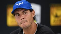 Spain&#039;s Rafael Nadal addresses a press conference ahead of the quarter-final round at the ATP World Tour Masters 1000 indoor tennis tournament on November 3, 2017 in Paris.
 World number one Rafael Nadal pulled out of the Paris Masters on November 3 before his quarter-final with a knee injury. / AFP PHOTO / CHRISTOPHE ARCHAMBAULT