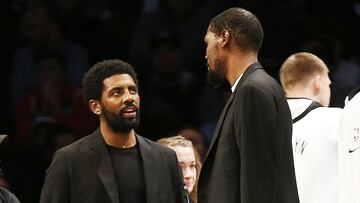 Nov 29, 2019; Brooklyn, NY, USA; Brooklyn Nets injured players Kyrie Irving (left) and Kevin Durant talk during a timeout against Boston Celtics during the second half at Barclays Center. Mandatory Credit: Andy Marlin-USA TODAY Sports