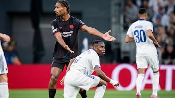 Bayer Leverkusen's French defender #05 Loic Bade (L) and FC Copenhagen's German forward #09 Youssoufa Moukoko argue during the UEFA Champions League league phase day 1 football match between FC Copenhagen and Bayer Leverkusen in Copenhagen, Denmark, on September 18, 2025. (Photo by Sebastian Elias Uth / Ritzau Scanpix / AFP) / Denmark OUT