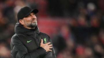 (FILES) Liverpool's German manager Jurgen Klopp celebrates after his team victory at the end of the English League Cup quarter-final football match between Liverpool and West Ham United at Anfield in Liverpool, north west England on December 20, 2023. Liverpool manager Jurgen Klopp announced the shock decision on January 26, 2024 that he will leave the club at the end of the season. (Photo by Oli SCARFF / AFP) / RESTRICTED TO EDITORIAL USE. No use with unauthorized audio, video, data, fixture lists, club/league logos or 'live' services. Online in-match use limited to 120 images. An additional 40 images may be used in extra time. No video emulation. Social media in-match use limited to 120 images. An additional 40 images may be used in extra time. No use in betting publications, games or single club/league/player publications. / 