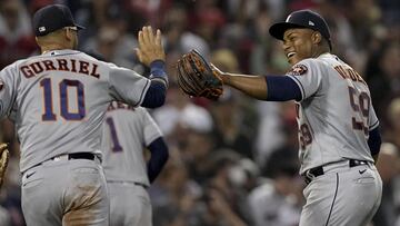 Houston Astros starting pitcher Framber Valdez celebrates the end of the seventh inning with first baseman Yuli Gurriel against the Boston Red Sox in Game 5 of baseball&#039;s American League Championship Series Wednesday, Oct. 20, 2021, in Boston. (AP Ph
