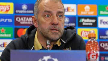 Barcelona's German coach Hans-Dieter Flick speaks during a press conference on the eve of the UEFA Champions League Round of 16 second leg football match between FC Barcelona and SL Benfica at the Joan Gamper training ground in Sant Joan Despi, near Barcelona, on March 10, 2025. (Photo by LLUIS GENE / AFP)