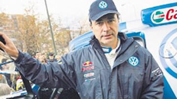 <b>ILUSIONADO. </b>Sainz mostró su Touareg a los aficionados madrileños.