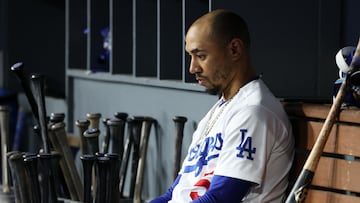 Oct 9, 2023; Los Angeles, California, USA; Los Angeles Dodgers right fielder Mookie Betts (50) sits in the dug out against the Arizona Diamondbacks in the eighth inning for game two of the NLDS for the 2023 MLB playoffs at Dodger Stadium. Mandatory Credit: Kiyoshi Mio-USA TODAY Sports