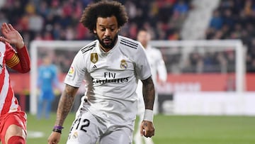 GIRONA, SPAIN - JANUARY 31: Alex Granell of Girona and Marcelo of Real Madrid in action during the Copa del Quarter Final match between Girona and Real Madrid at Montilivi Stadium