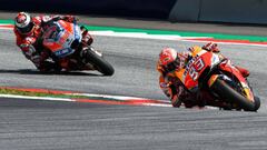 Repsol Honda Team&#039;s Spanish rider Marc Marquez (R) and Ducati Team&#039;s Spanish rider Jorge Lorenzo compete during the Austrian MotoGP Grand Prix race at the Red Bull Ring in Spielberg, Austria on August 12, 2018. (Photo by Jure Makovec / AFP)