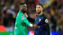 Soccer Football - Champions League - Group B - RC Lens v Sevilla - Stade Bollaert-Delelis, Lens, France - December 12, 2023 Sevilla's Sergio Ramos and RC Lens' Brice Samba after the match REUTERS/Pascal Rossignol