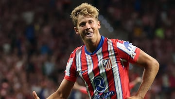 Atletico Madrid's Spanish midfielder #14 Marcos Llorente celebrates scoring his team's second goal during the Spanish league football match between Club Atletico de Madrid and Girona FC at the Metropolitano stadium in Madrid on August 25, 2024. (Photo by Pierre-Philippe MARCOU / AFP)