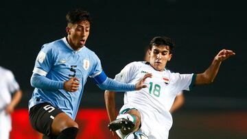 Soccer Football - FIFA U20 World Cup Argentina 2023 - Group E - Uruguay v Iraq - Estadio Unico Diego Armando Maradona, La Plata, Argentina - May 22, 2023 Uruguay's Fabricio Diaz in action with Iraq's Ali Sadeq Mahmood Shaheen REUTERS/Matias Baglietto