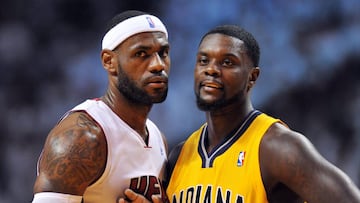 May 30, 2014; Miami, FL, USA; Miami Heat forward LeBron James (left) stands next to Indiana Pacers guard Lance Stephenson (right) during the first half in game six of the Eastern Conference Finals of the 2014 NBA Playoffs at American Airlines Arena. Mandatory Credit: Steve Mitchell-USA TODAY Sports