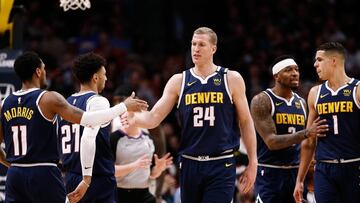 Jan 12, 2020; Denver, Colorado, USA; Denver Nuggets forward Mason Plumlee (24) reacts with guard Monte Morris (11) ahead of guard Jamal Murray (27) and forward Torrey Craig (3) and forward Michael Porter Jr. (1) in the fourth quarter against the Los Angeles Clippers at the Pepsi Center. Mandatory Credit: Isaiah J. Downing-USA TODAY Sports