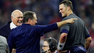 HOUSTON, TX - FEBRUARY 05: Head coach Bill Belichick of the New England Patriots and Tom Brady #12 talk after defeating the Atlanta Falcons 34-28 in overtime during Super Bowl 51 at NRG Stadium on February 5, 2017 in Houston, Texas. Jamie Squire/Getty Images/AFP
== FOR NEWSPAPERS, INTERNET, TELCOS & TELEVISION USE ONLY ==