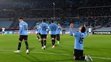 Uruguay's midfielder Maximiliano Araujo (R) celebrates after scoring during the friendly football match between Uruguay and Cuba, at the Centenario stadium in Montevideo, on June 20, 2023. (Photo by Pablo PORCIUNCULA / AFP)